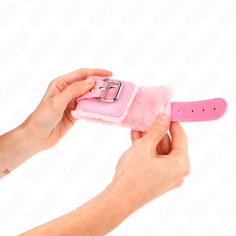 KINK - ROSA PELZGEFÜTTERTE HANDGELENKSTÜTZEN MIT VERSTELLBAREM ROSA GÜRTEL 17-29 CM X 6 CM