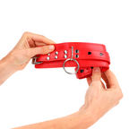 KINK - ROTE HANDGELENKSFESSEL MIT SCHWARZER HERZEINLAGE VERSTELLBAR 21-28 CM X 5,5 CM