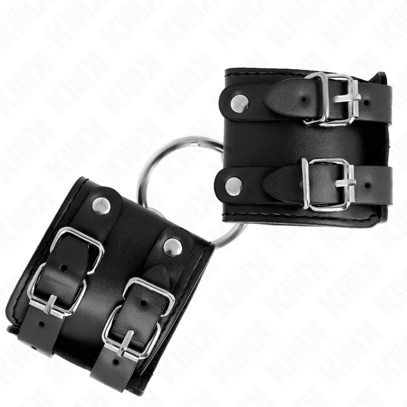 KINK - FIXE HANDGELENKMANSCHETTE MIT RING UND VERSTELLBAREN NIETEN SCHWARZ 17-22 CM X 6,5 CM