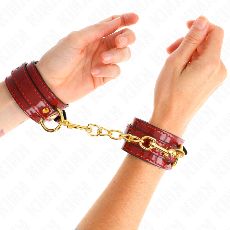 KINK - HANDGELENKFESSELN JOANNA ANGEL ROT VERSTELLBAR MIT GOLDKETTE 16,5-26 CM X 4 CM
